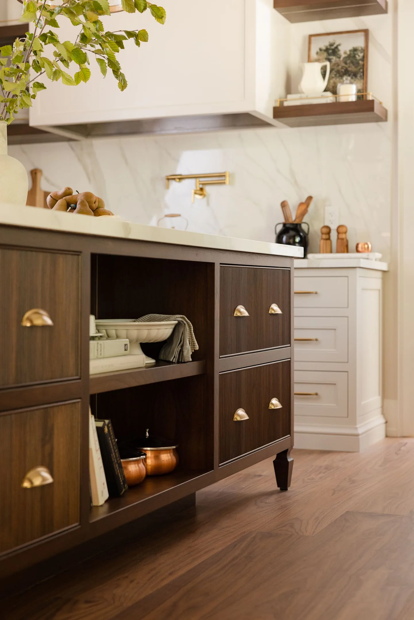 Walnut island with open shelving, drawers and turned legs