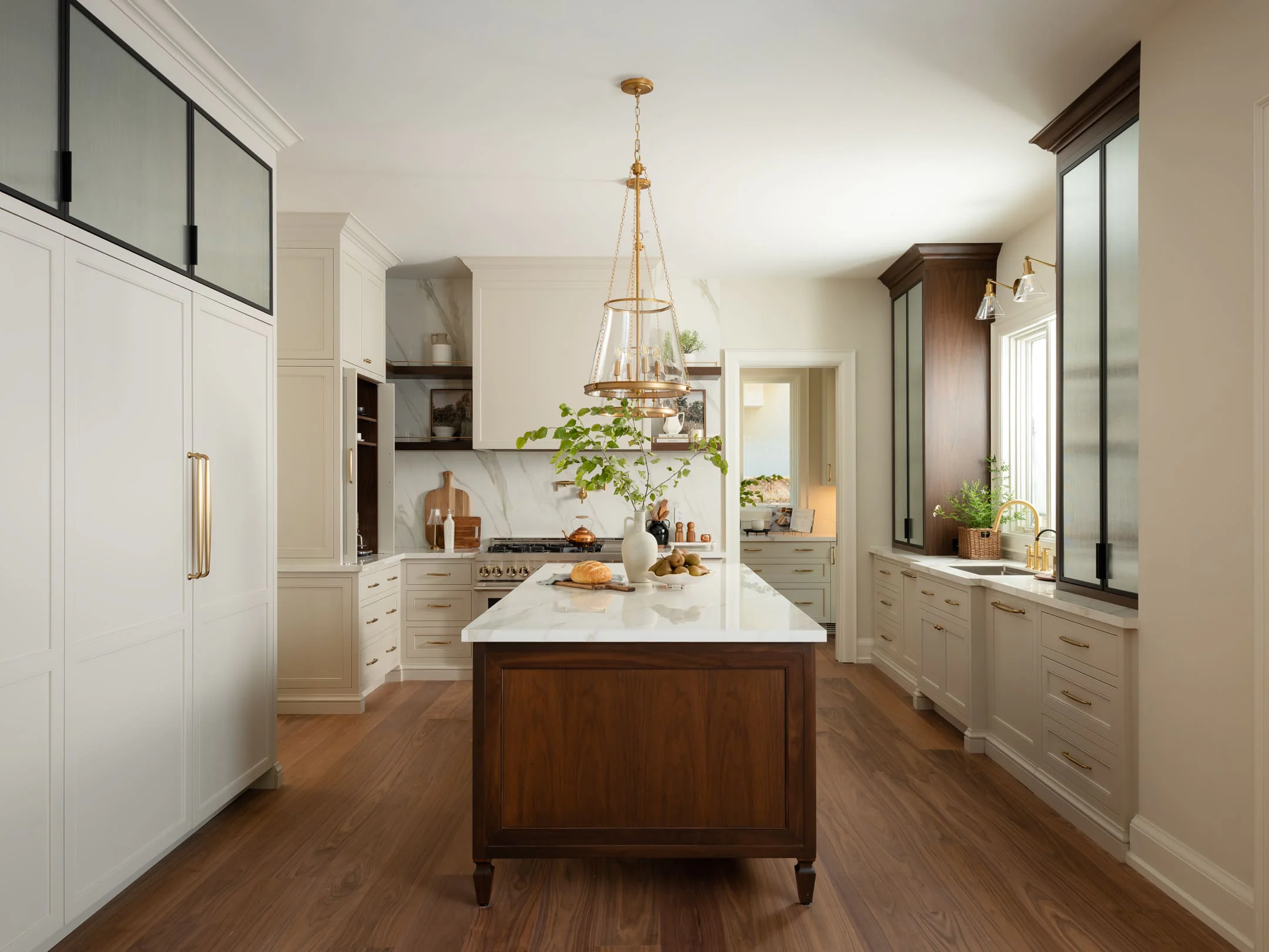 Bell Royal kitchen with painted framed inset cabinetry and a furniture-style walnut island