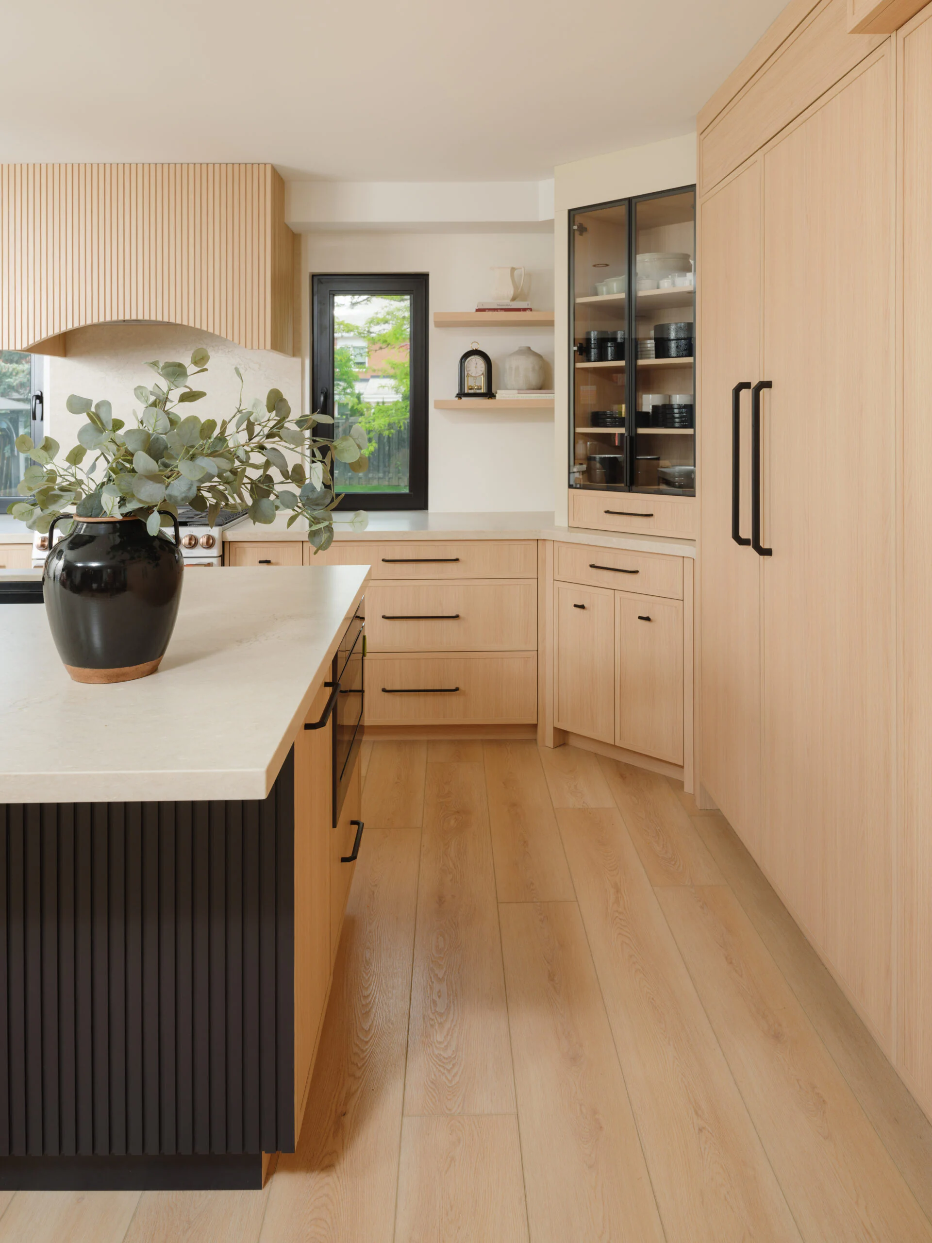 Custom kitchen island and perimeter cabinetry in an Oakville kitchen
