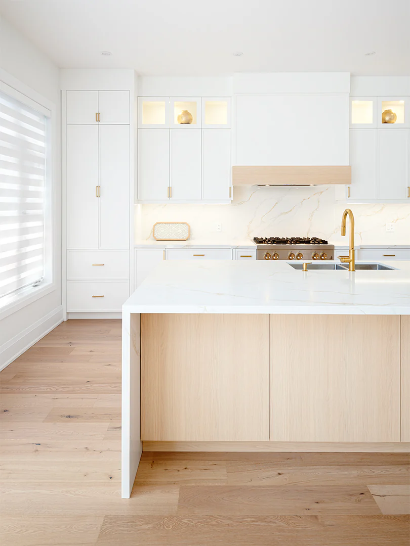 White oak island fronts within a stone waterfall surround